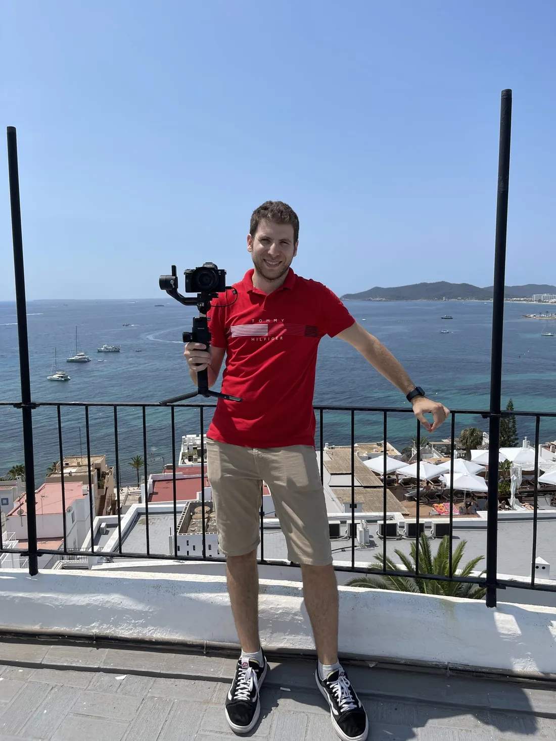 Gabriel on a terrace overlooking the sea in Ibiza